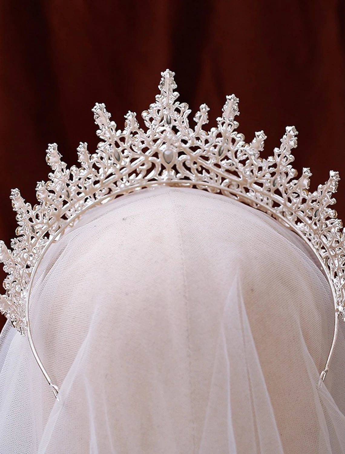 Side view of a sparkling princess tiara.