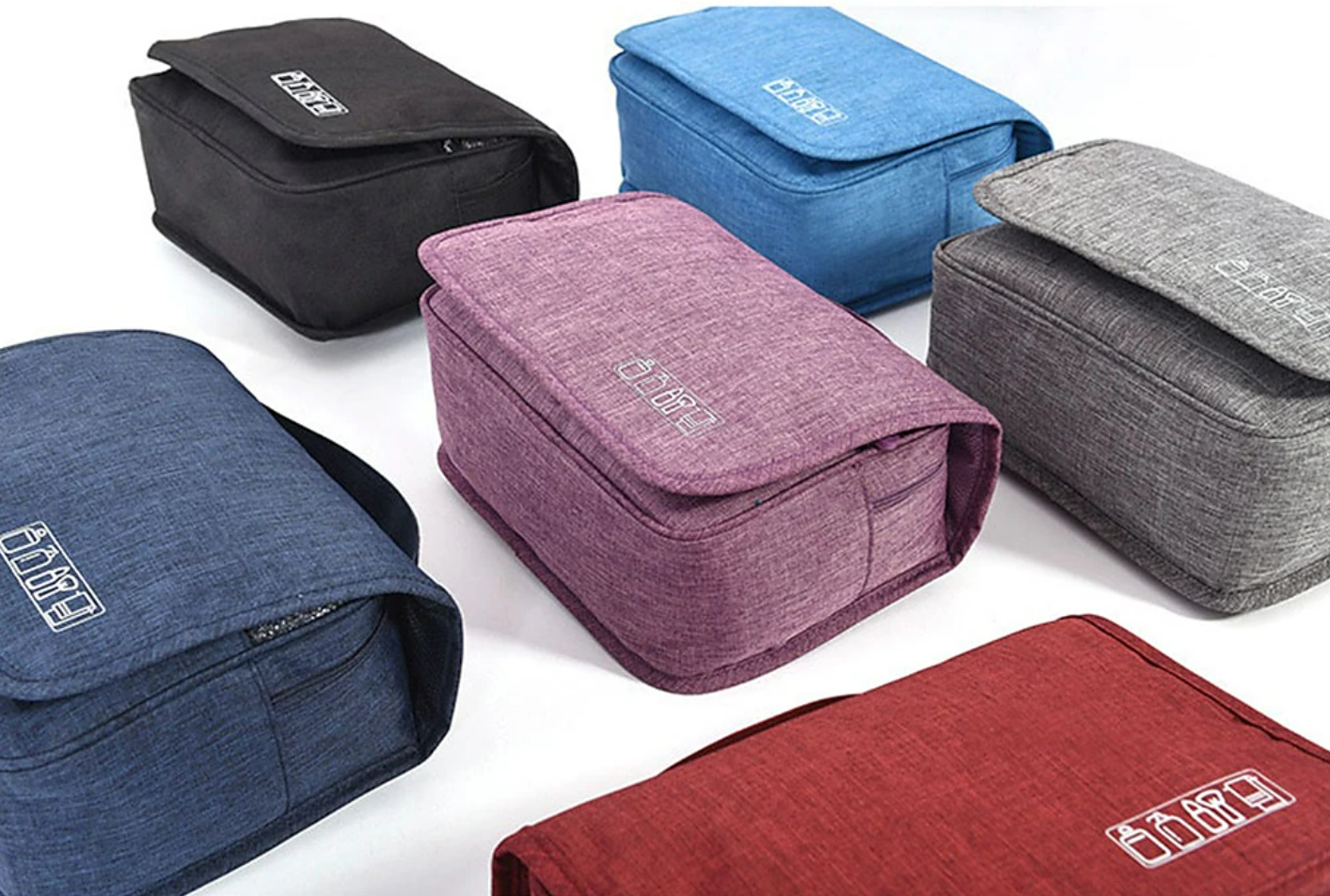 Black travel dopp kit with a secure zipper closure.