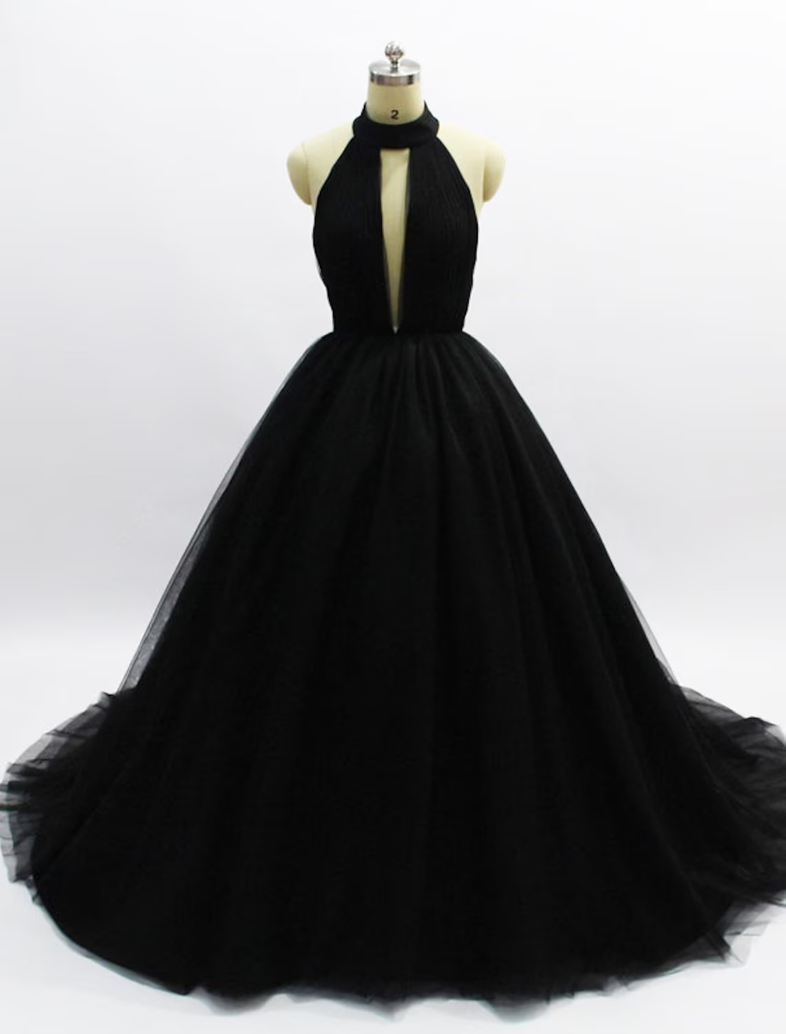 Back view of the tulle ball gown with a long court train.