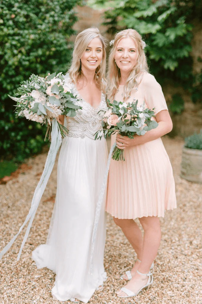 Front view of modest deep V-neck bridal dress.