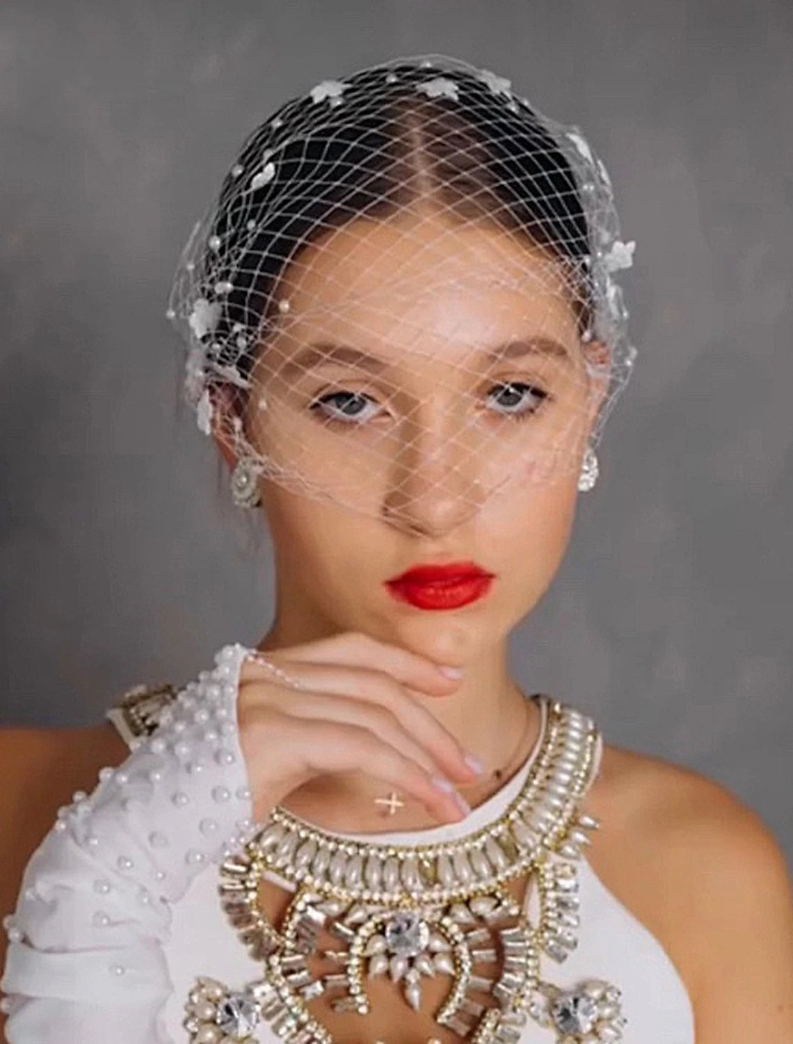 One-tier bridal veil showcasing the texture of petal tulle.