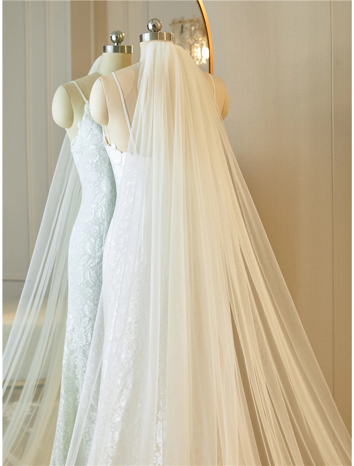 Side view of a bride wearing the one-tier lace wedding veil with appliques.