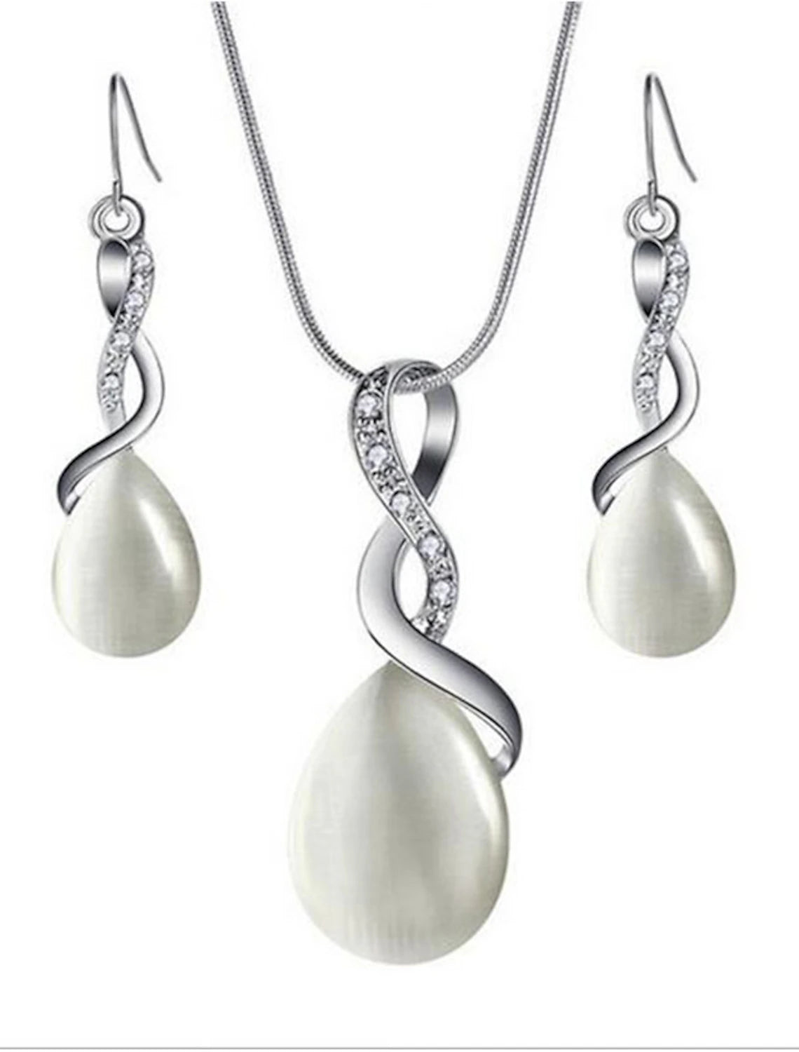 Close-up of an opal crystal silver-plated drop earring.