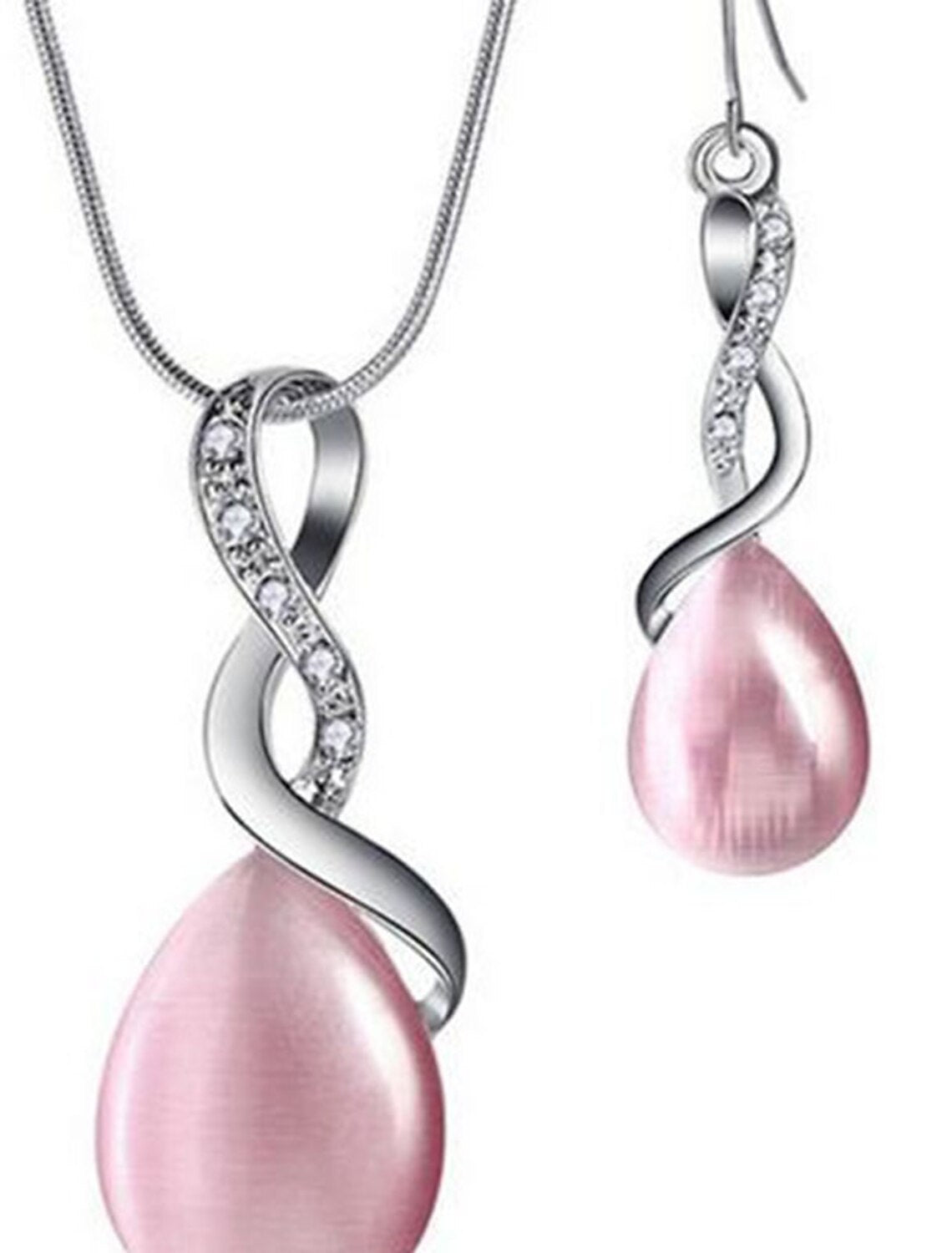 Woman modeling the elegant opal crystal jewelry set.