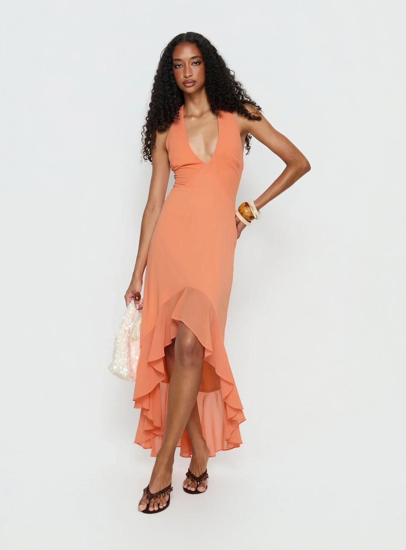 Orange Halter Prom Dress with Deep V Neckline and High Low Skirt for Formal Events and Prom Nights