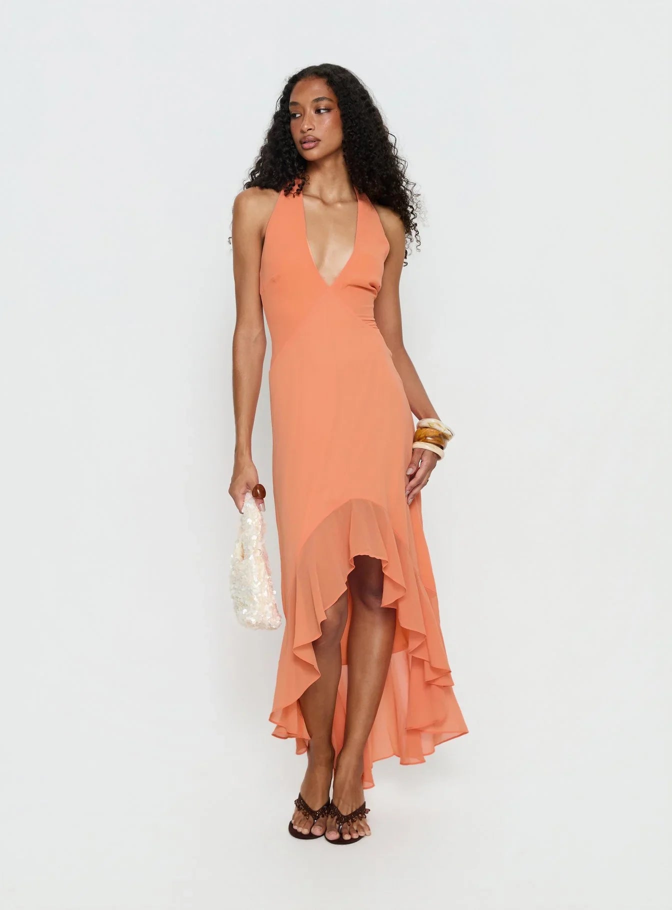 Orange Halter Prom Dress with Deep V Neckline and High Low Skirt for Formal Events and Prom Nights