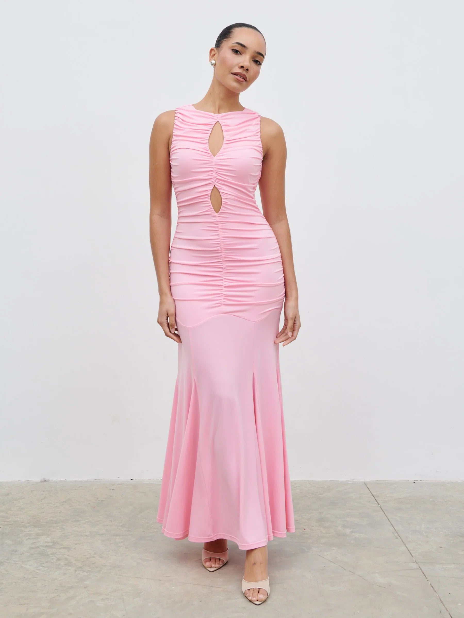 Pink Ruched Mermaid Prom Dress with Cutout Keyhole Neckline and Sleeveless Design for Formal Events and Evening Occasions