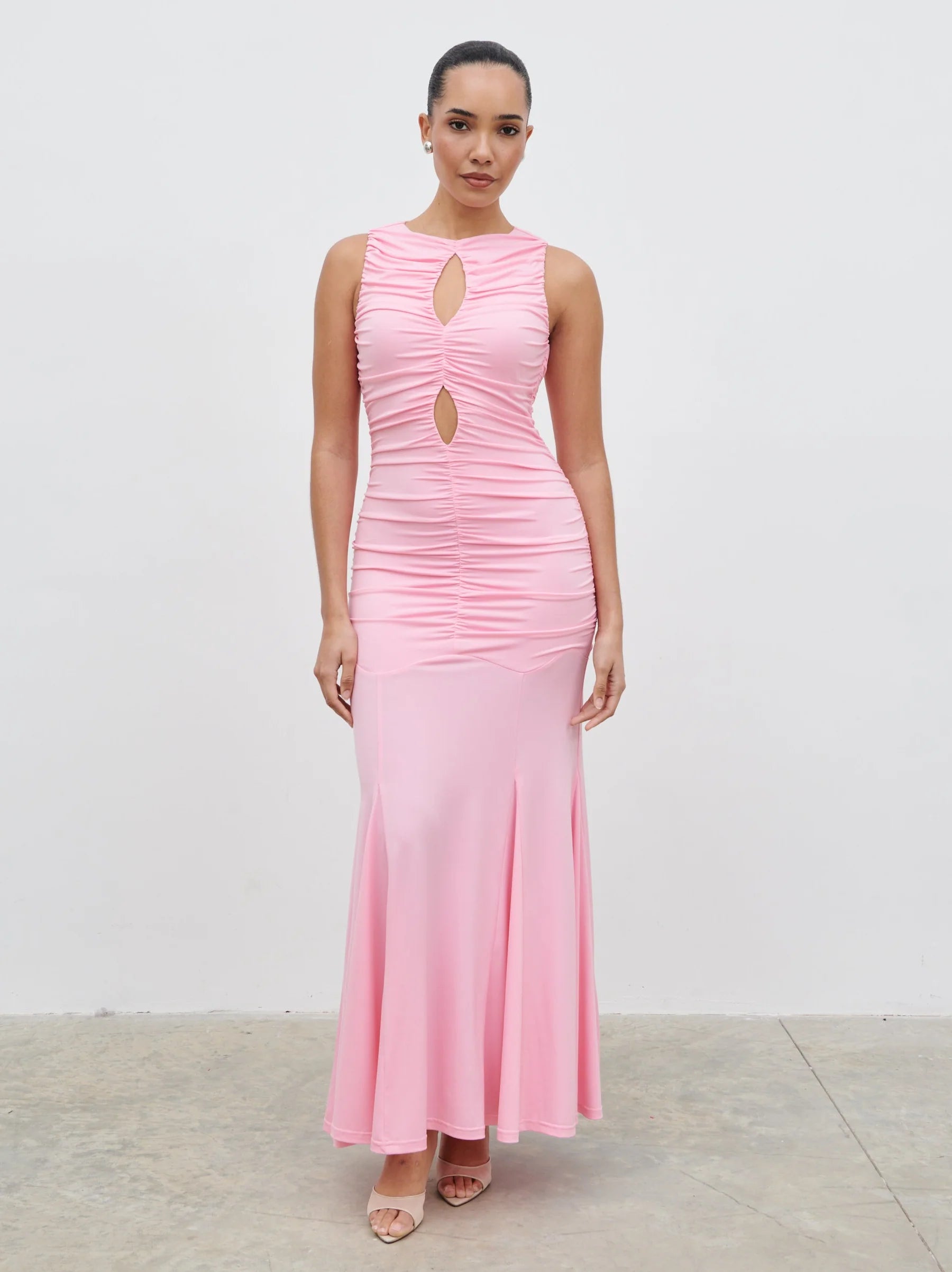 Pink Ruched Mermaid Prom Dress with Cutout Keyhole Neckline and Sleeveless Design for Formal Events and Evening Occasions