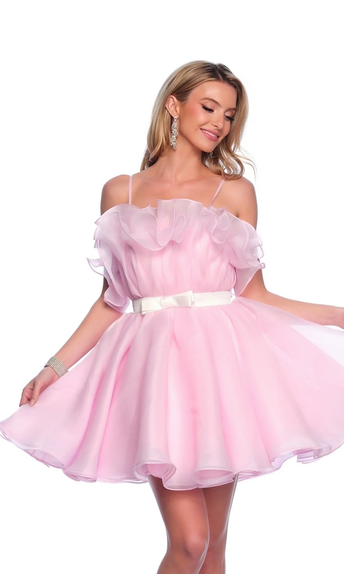 Blush pink A-line homecoming dress with spaghetti straps and ruffled organza bodice.