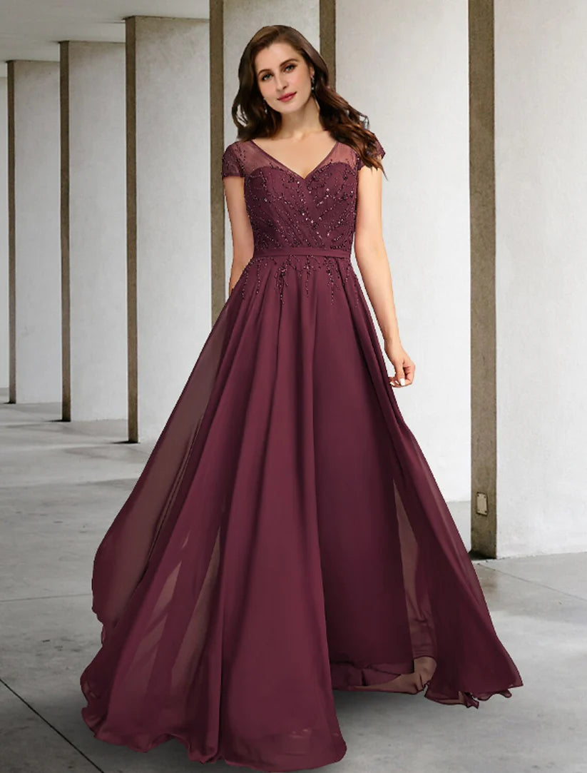 Elegant Plus Size A-Line Mother of the Bride Dress with V-neck and short sleeves.