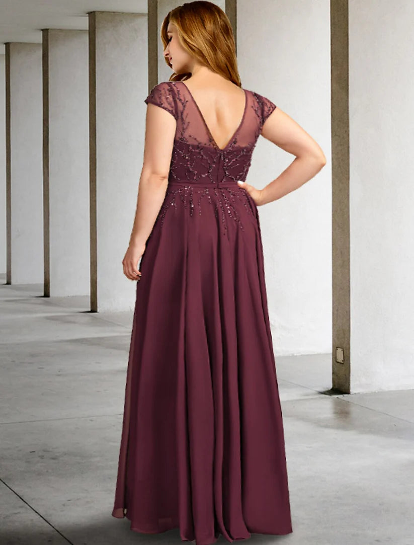 Back view of a floor-length chiffon A-Line formal dress with pleats.