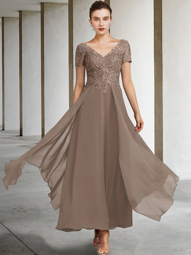 Plus size A-line mother of the bride dress with V-neck, short sleeves, and appliques.