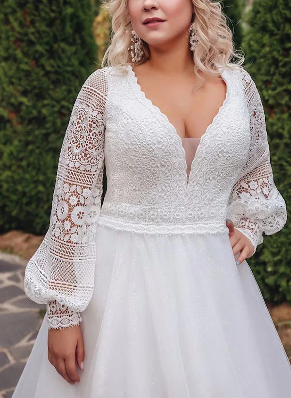 Back view of plus size A-line wedding dress, featuring V-neck and lace details.