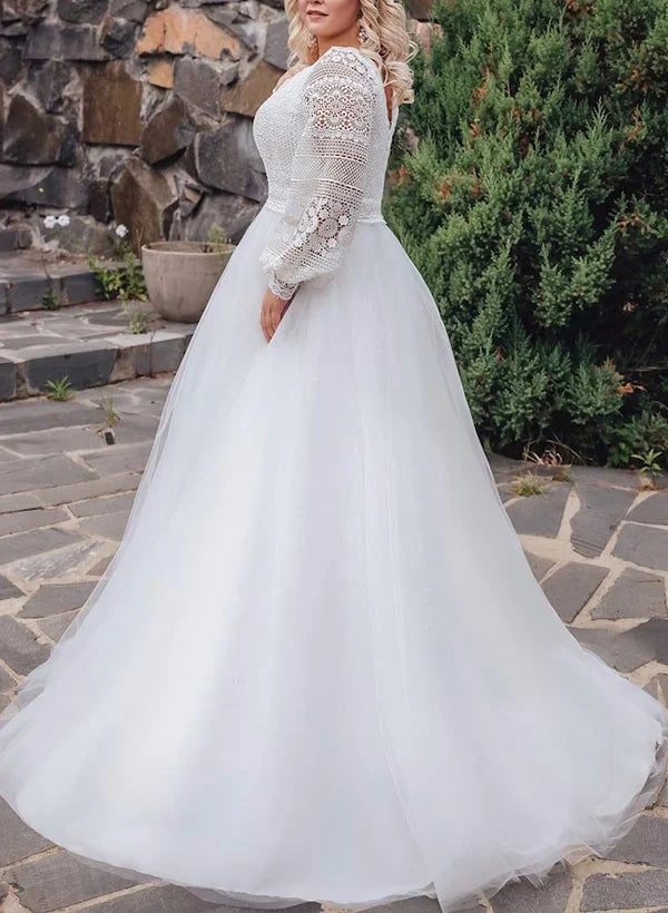Side profile of elegant plus size A-line V-neck wedding dress with lace.