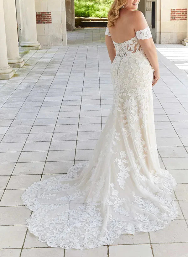 Model wearing an elegant plus size mermaid bridal gown.