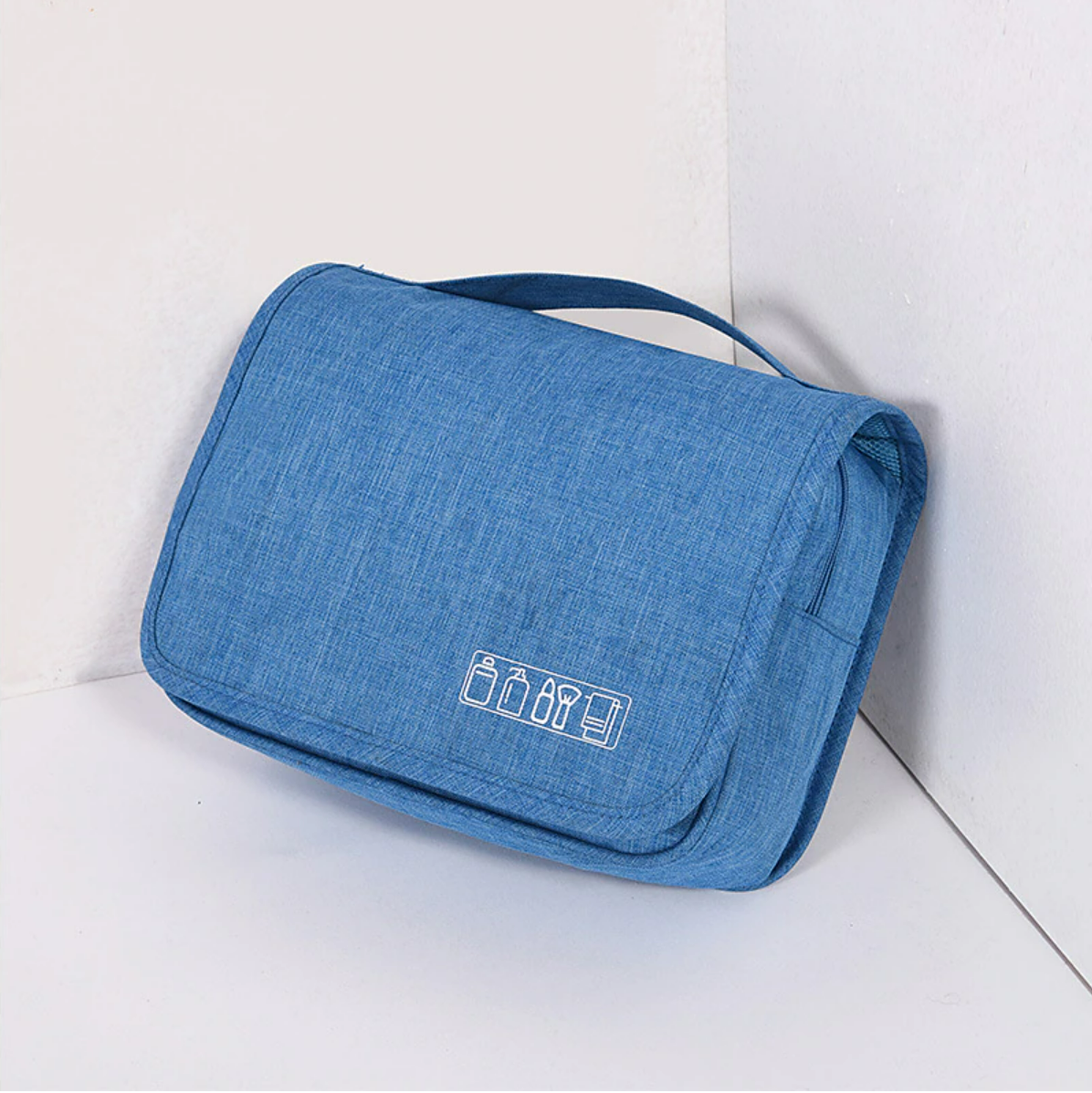 Portable cosmetic bag with dry and wet separation feature.