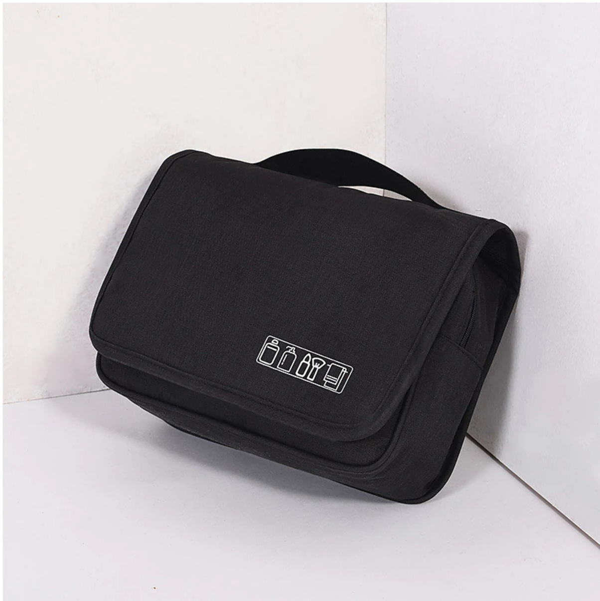 Side view of the compact travel wash bag.