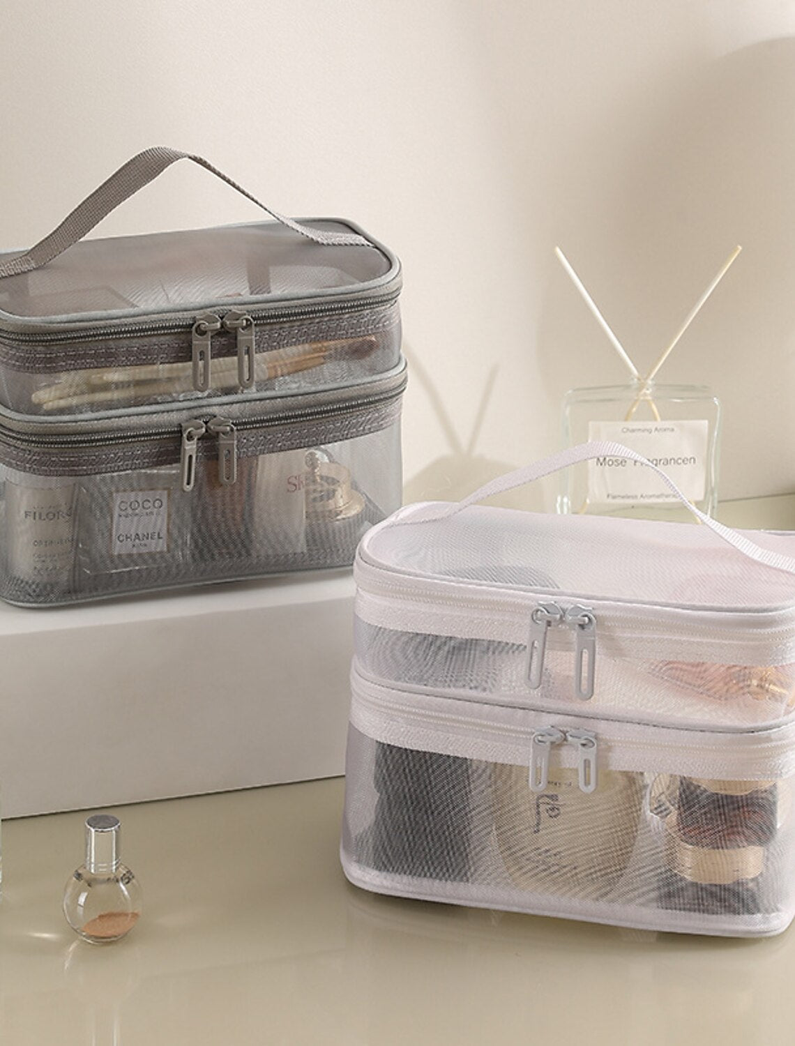 Mesh travel bag with secure zipper closure.