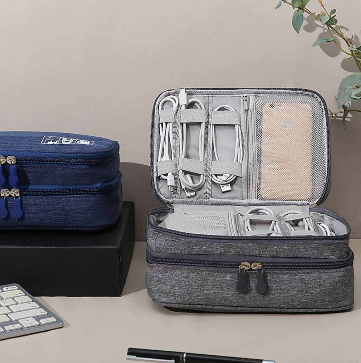 Open digital organizer bag showing multiple mesh pockets and compartments.