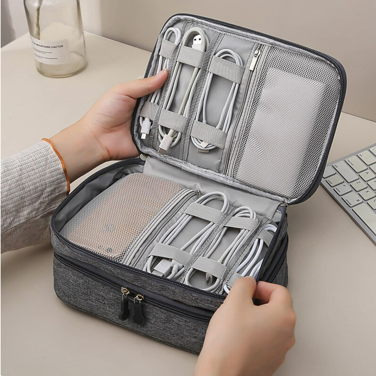 Closed portable travel digital storage bag, front view.