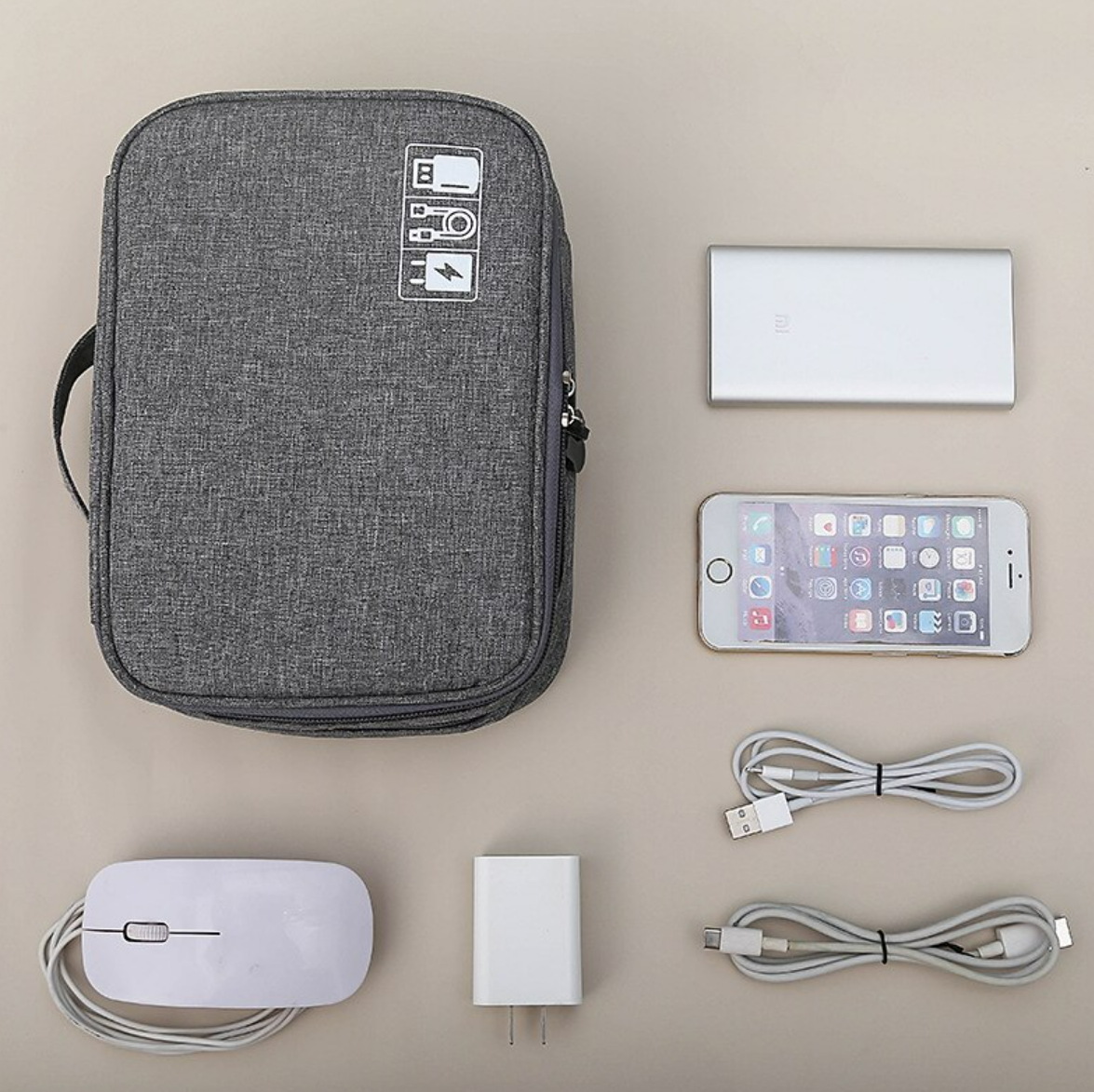 Digital storage case with various electronic items neatly arranged inside.