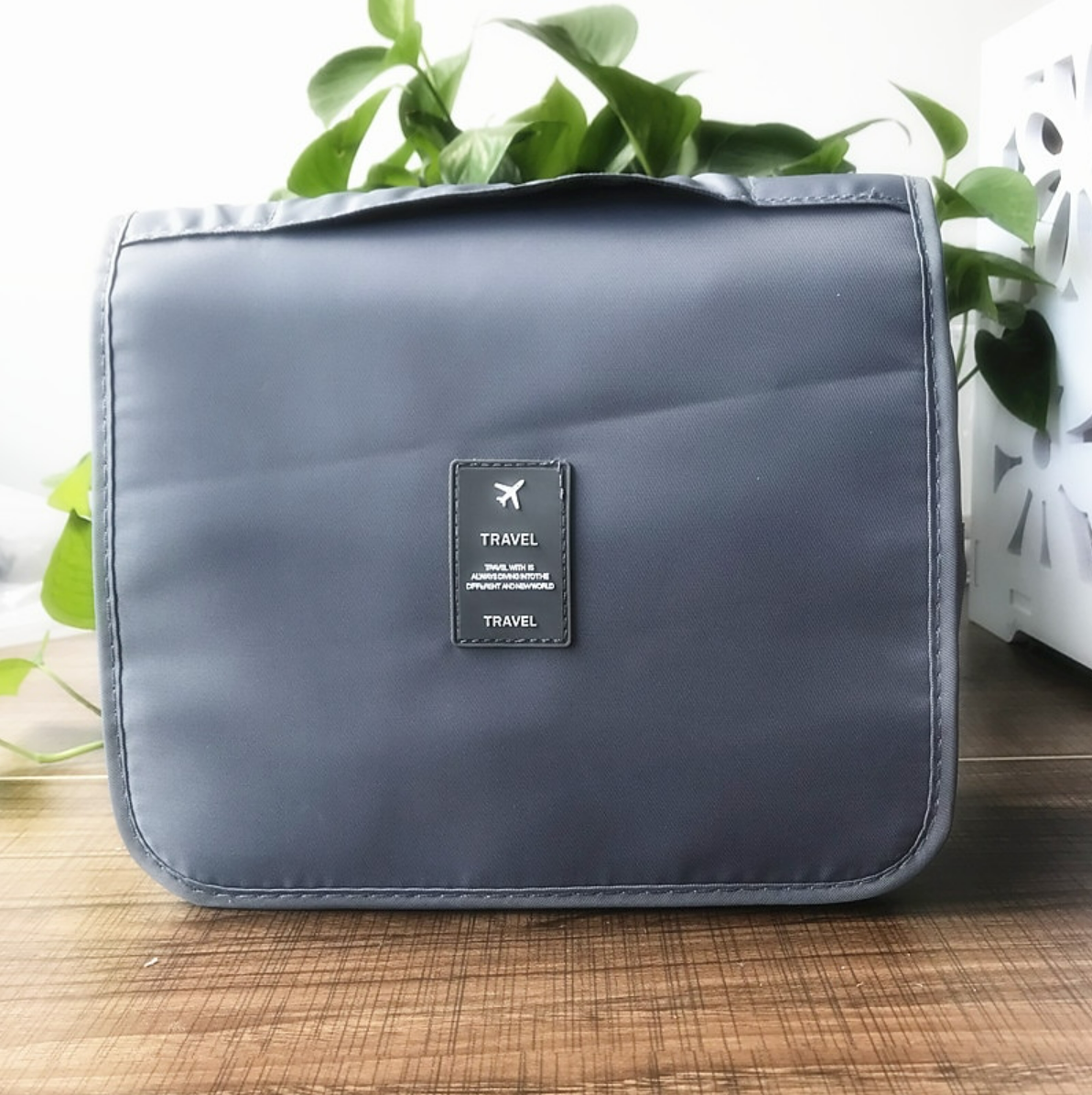 Portable twill wash bag, compact for packing.