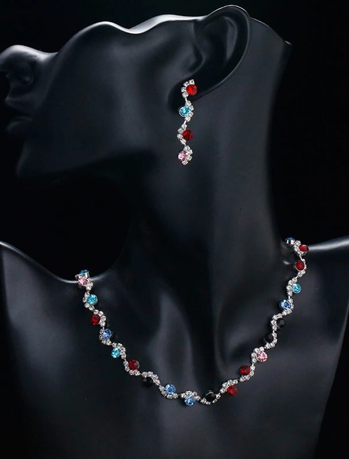 Rhinestone alloy bridal jewelry set with necklace and earrings.