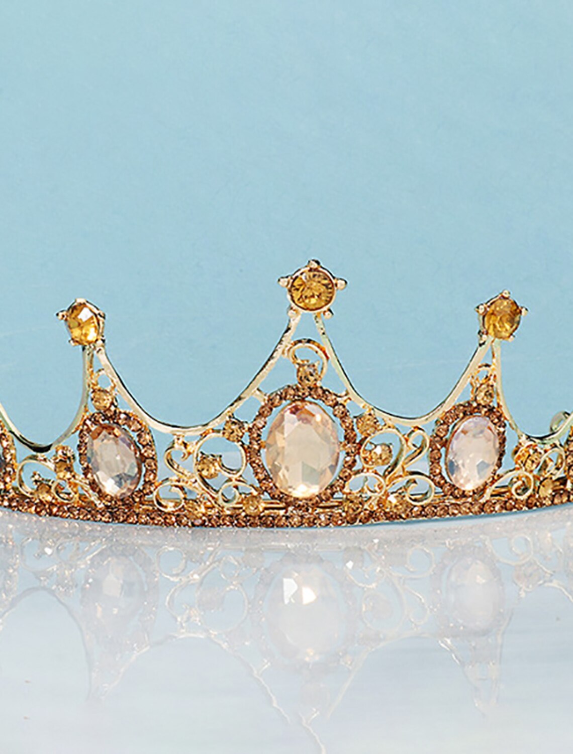 Rhinestone and crystal crown tiara headpiece.