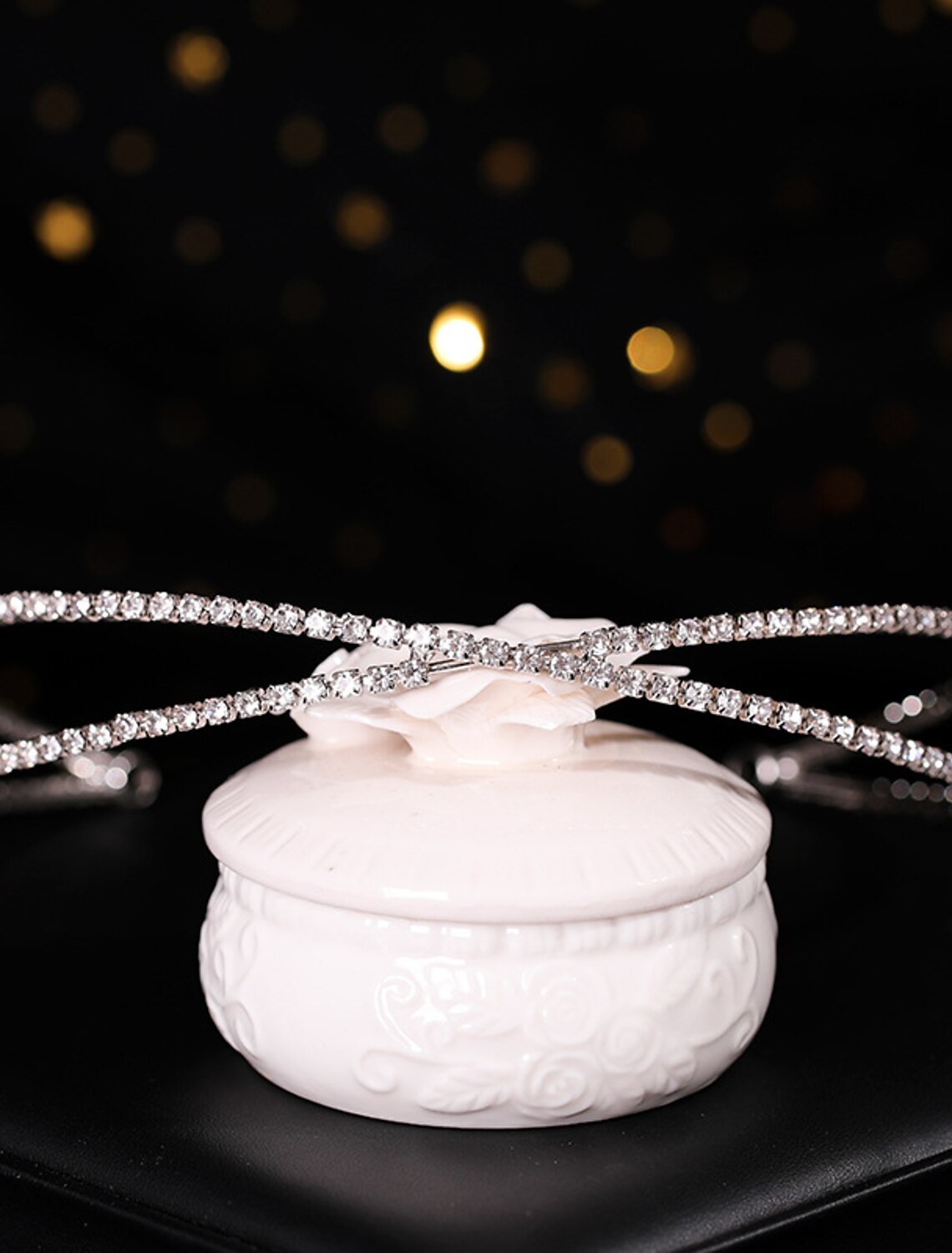 Side view of a decorative rhinestone crown.