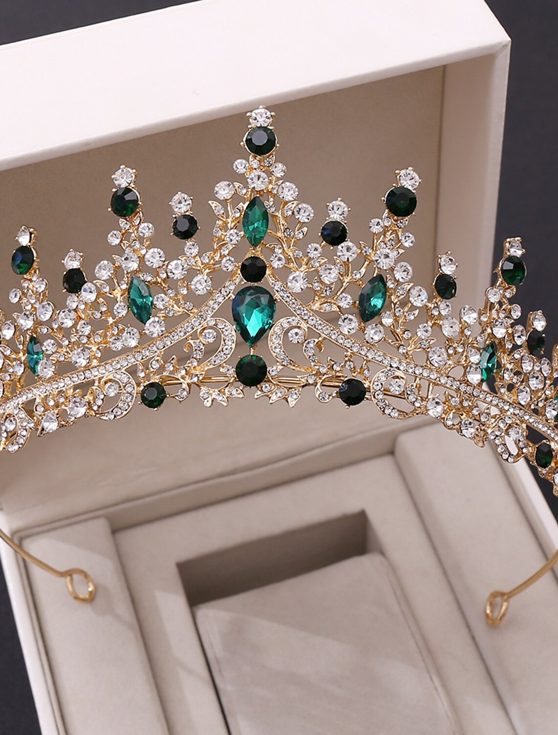 Detailed view of the crystal embellishments on the tiara.