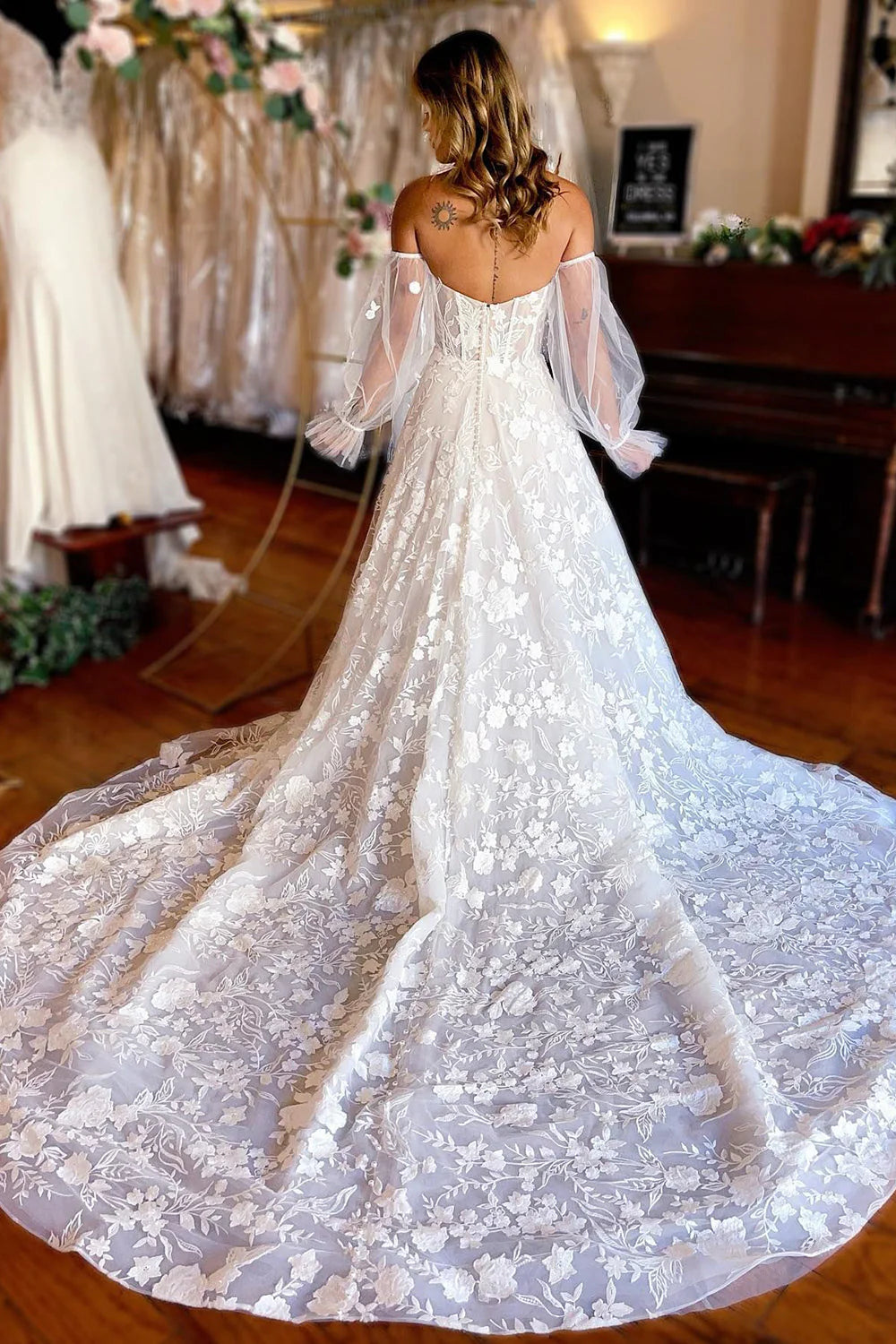 Back view of the A-Line lace wedding dress, showing corset detailing.