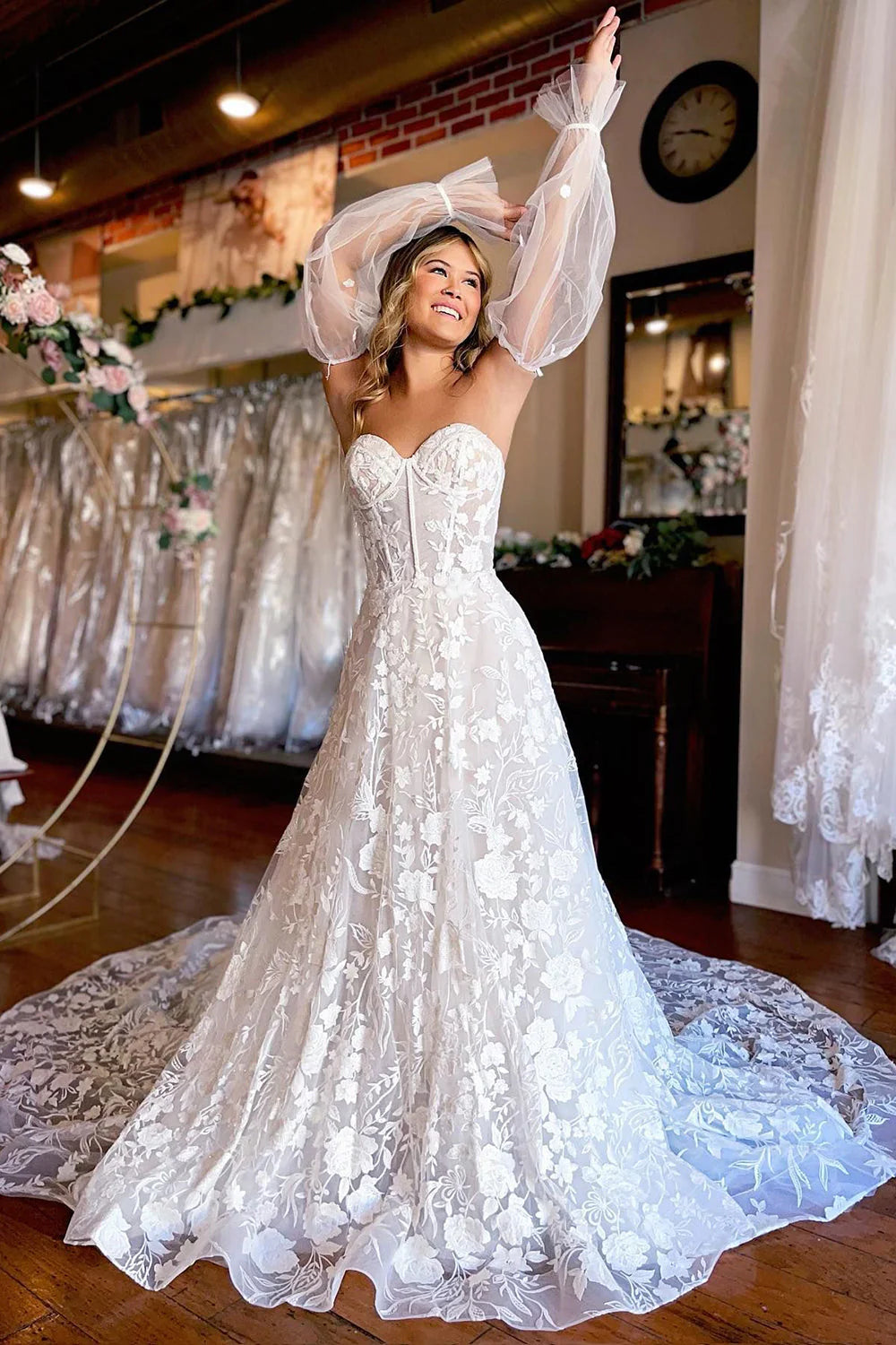 Side view of the A-Line wedding dress with detachable long sleeves.