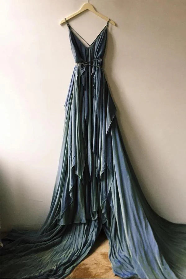 Side view of a bride wearing a chiffon beach wedding gown.
