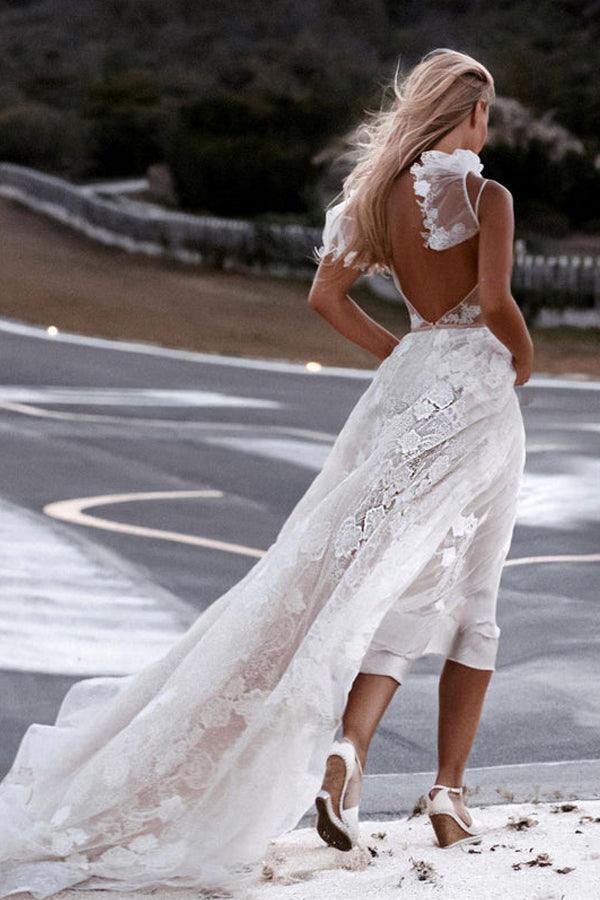 Full length view of the A-line V-neck spaghetti strap wedding dress.