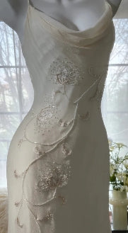 Close-up of the sweetheart neckline and straps.