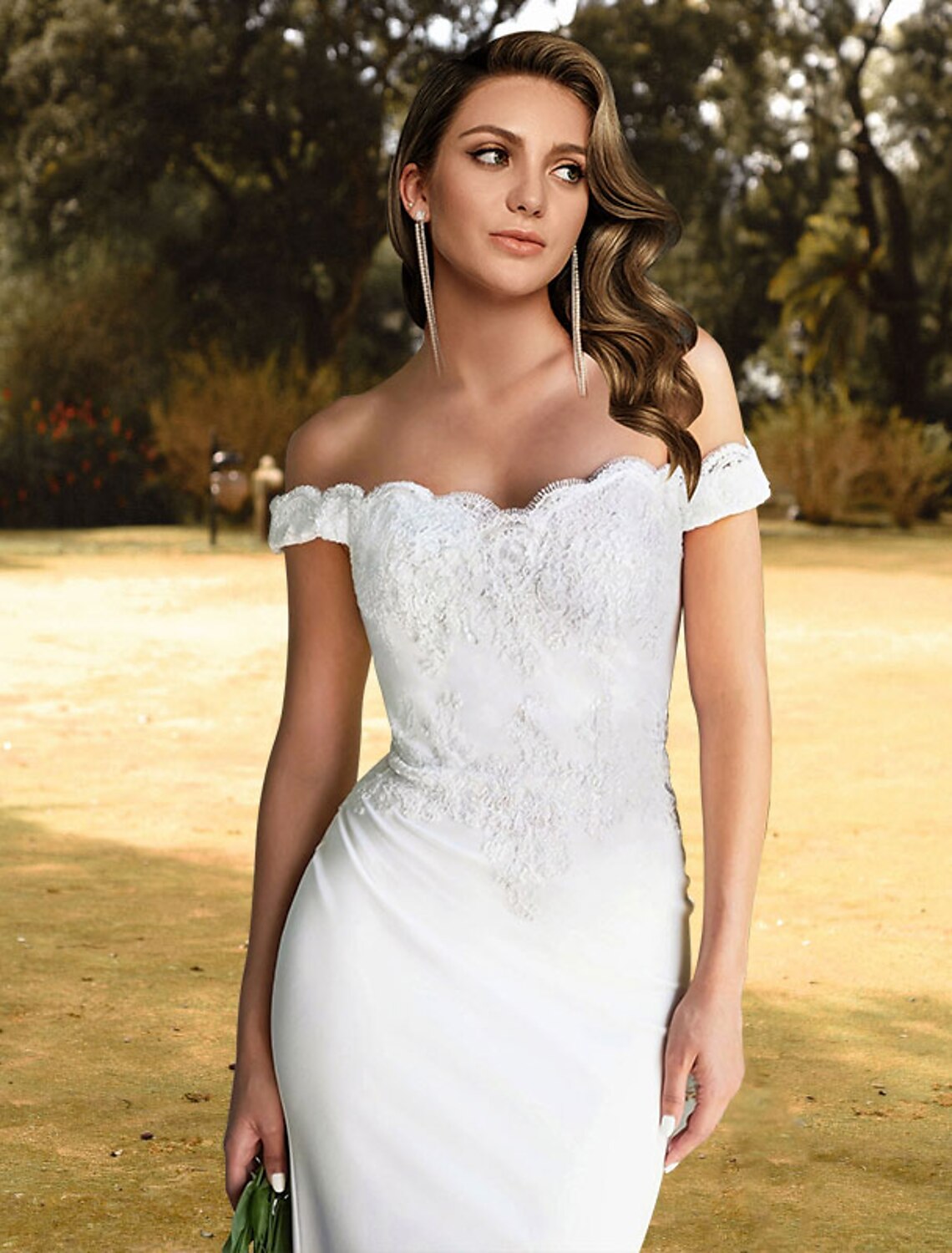 Close-up of the intricate lace and applique details on the off-shoulder wedding dress.