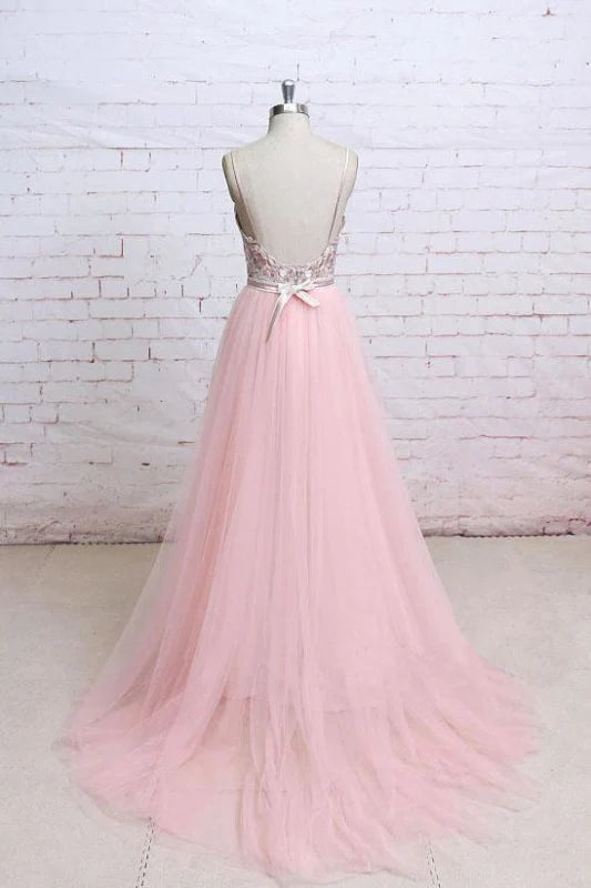 Side view of the lace and tulle maxi dress, highlighting floral details.