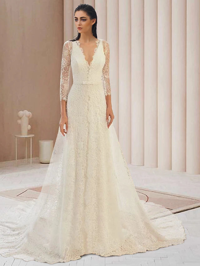 Elegant two-piece V-neck long sleeve lace wedding dress with court train.