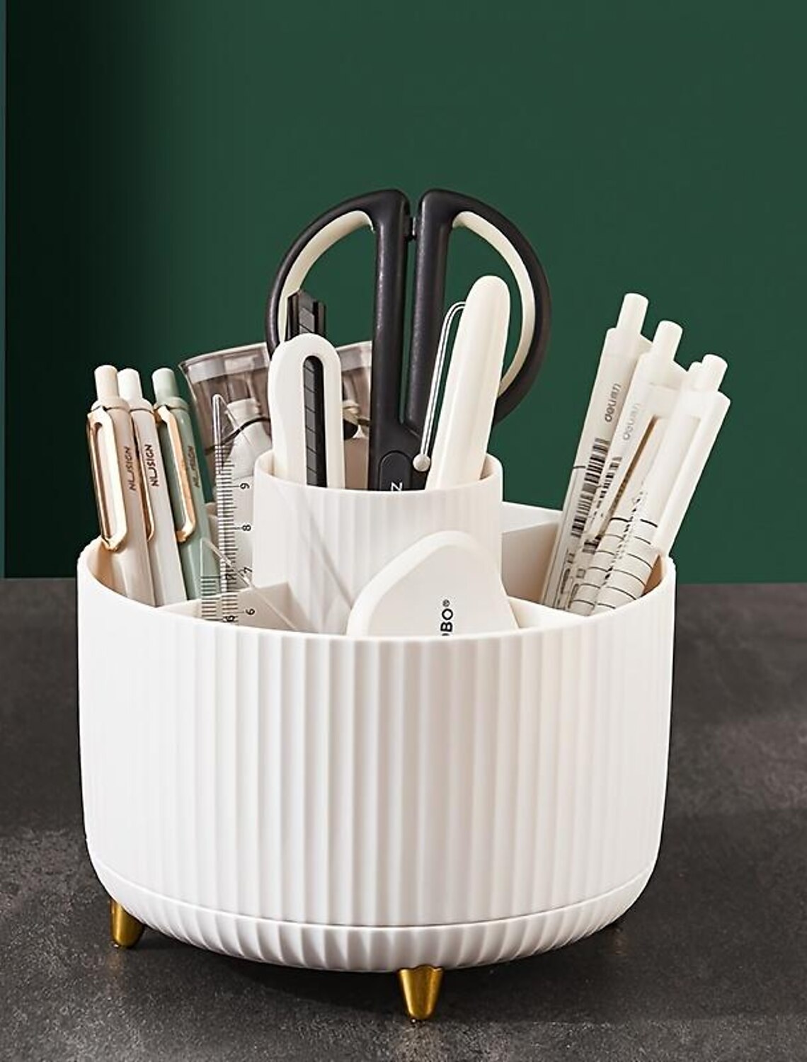 360-degree rotating base of a makeup brush holder.