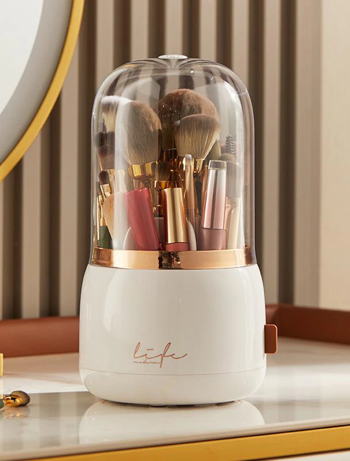 Angled view of a dustproof makeup brush holder with smooth rotation.