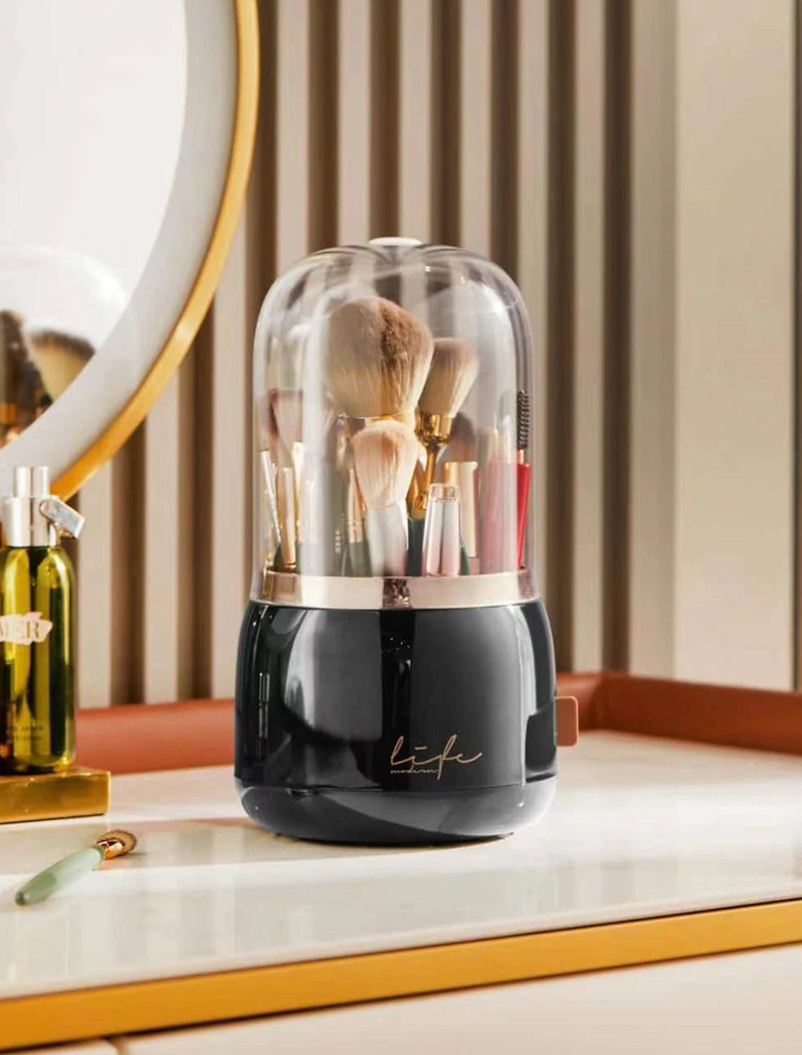 Makeup brush holder with its clear lid partially open.