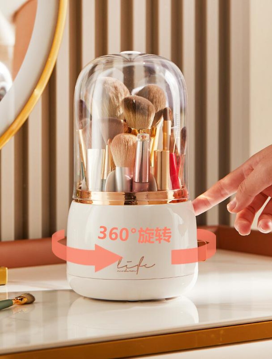 Makeup brush organizer displayed on a vanity table with other beauty products.