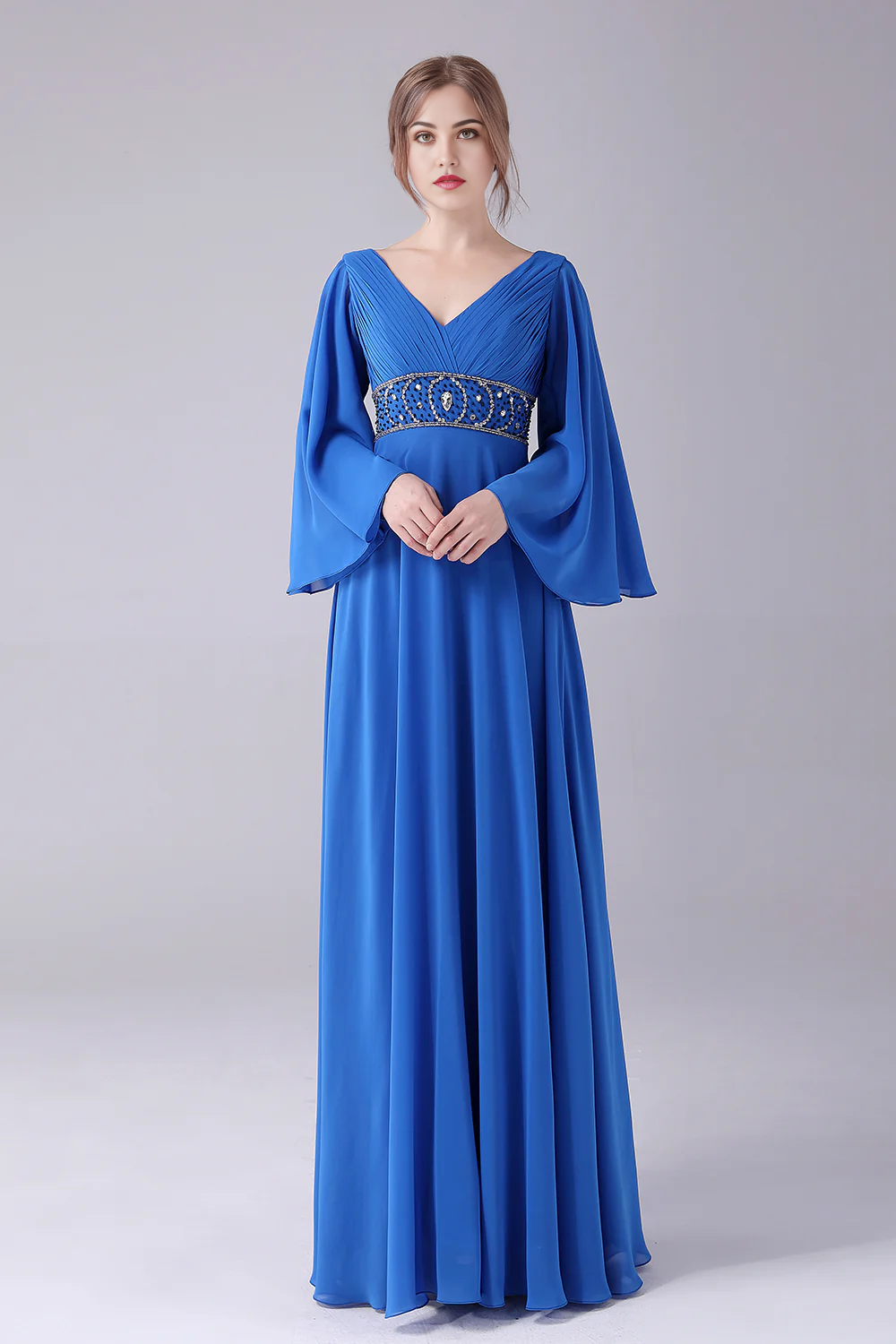 Elegant A-line V-neck gown with beading.