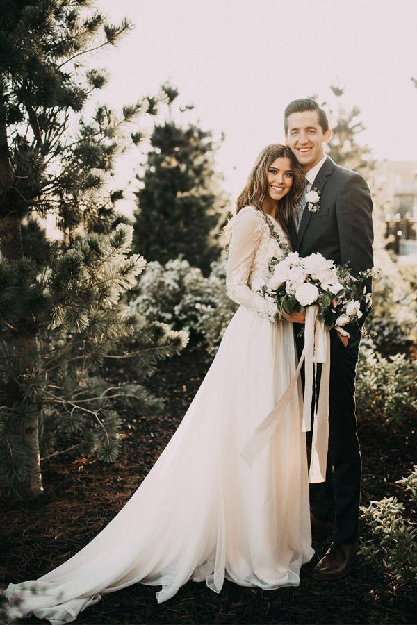 Back view of an elegant long sleeve lace wedding dress.