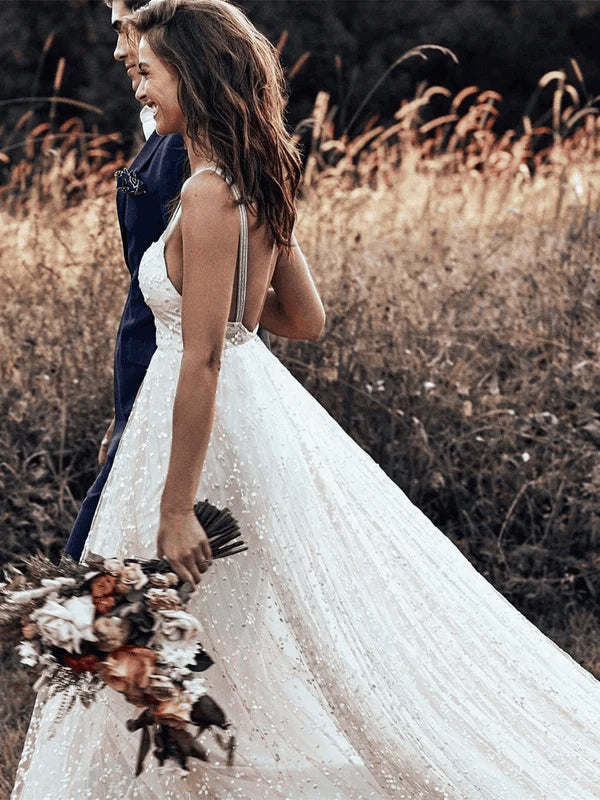 Front view of the V-neck A-line wedding dress with straps.