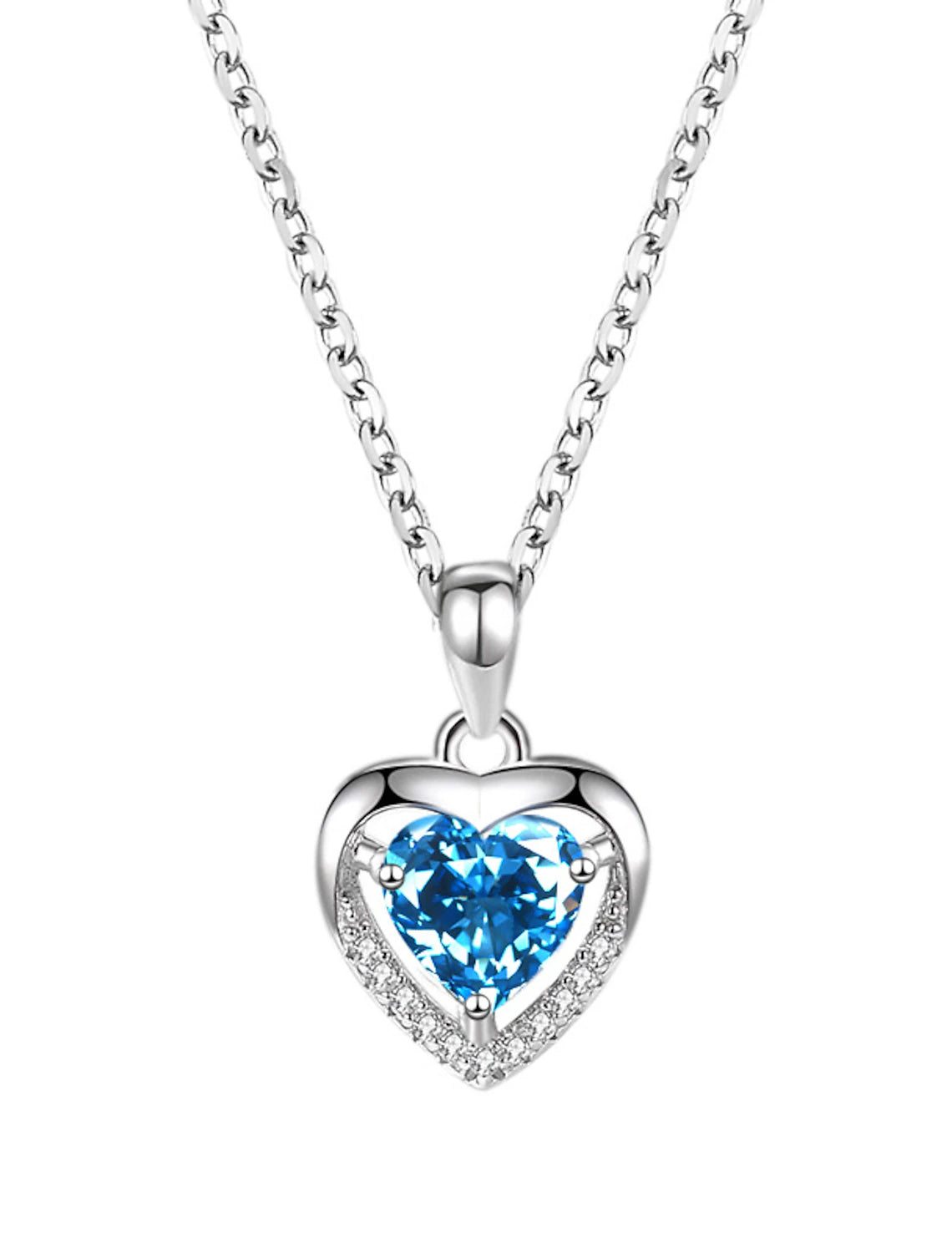 Artistic heart pendant necklace on a display.