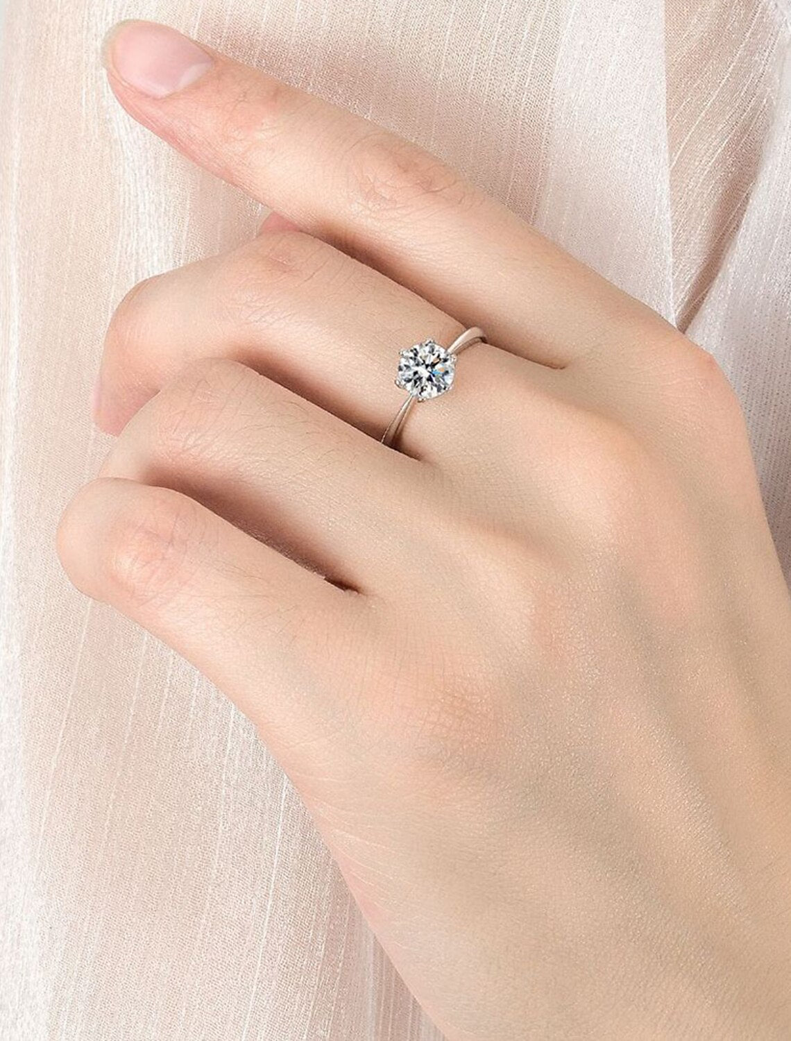 Close-up of S925 sterling silver geometrical wedding ring.