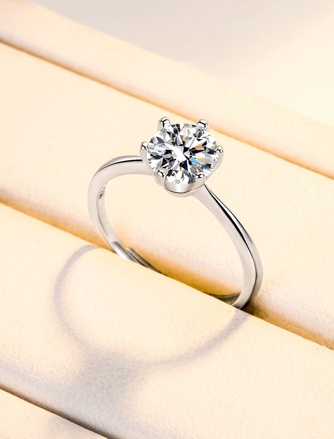Stylish S925 sterling silver wedding band on a white background.