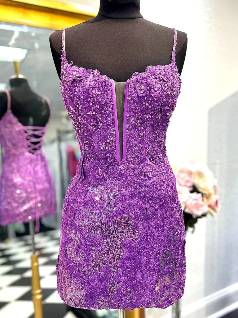Close-up of the sequin and lace detail on the V-neck dress.