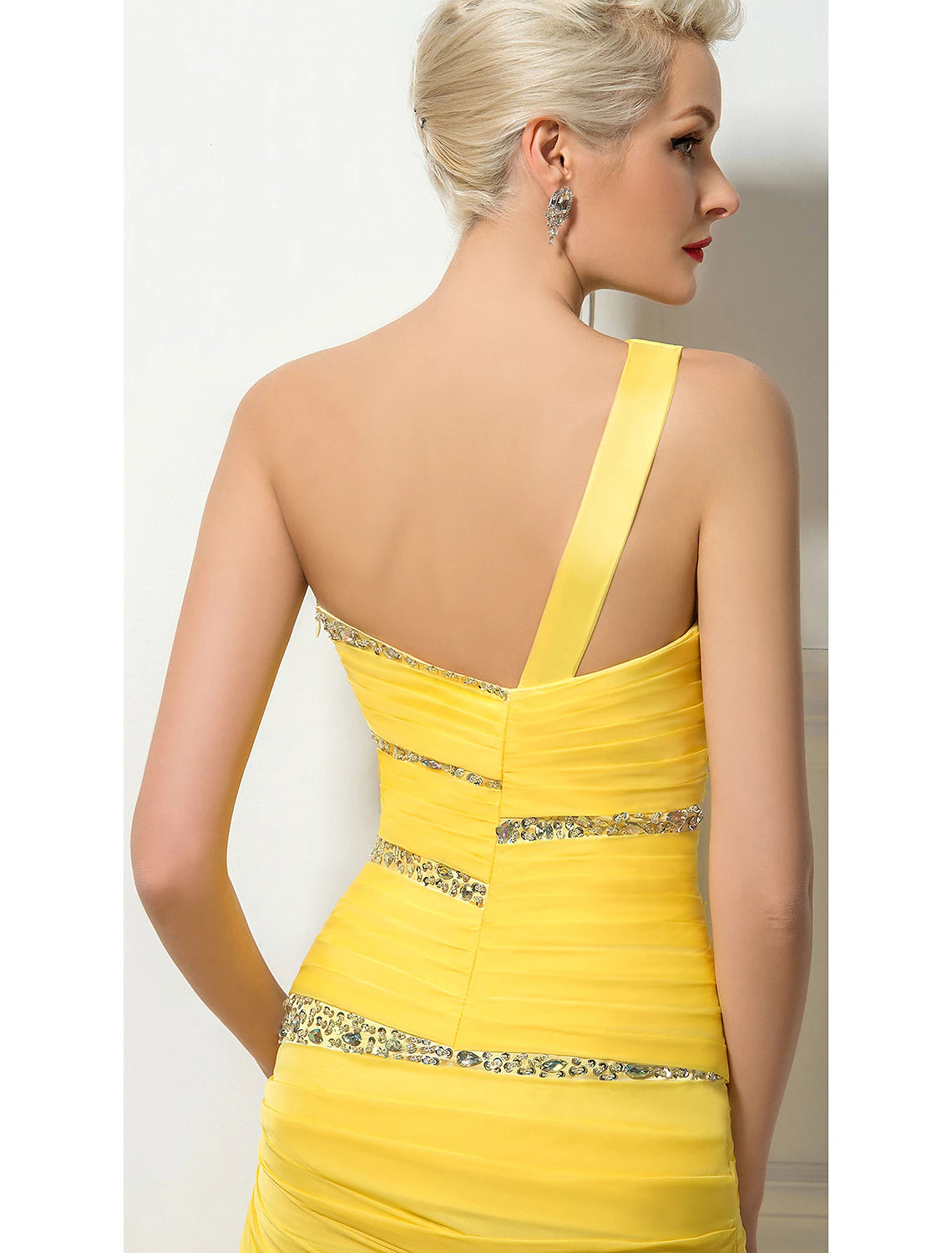 Back view of the one-shoulder backless chiffon evening dress, highlighting the sweep train.